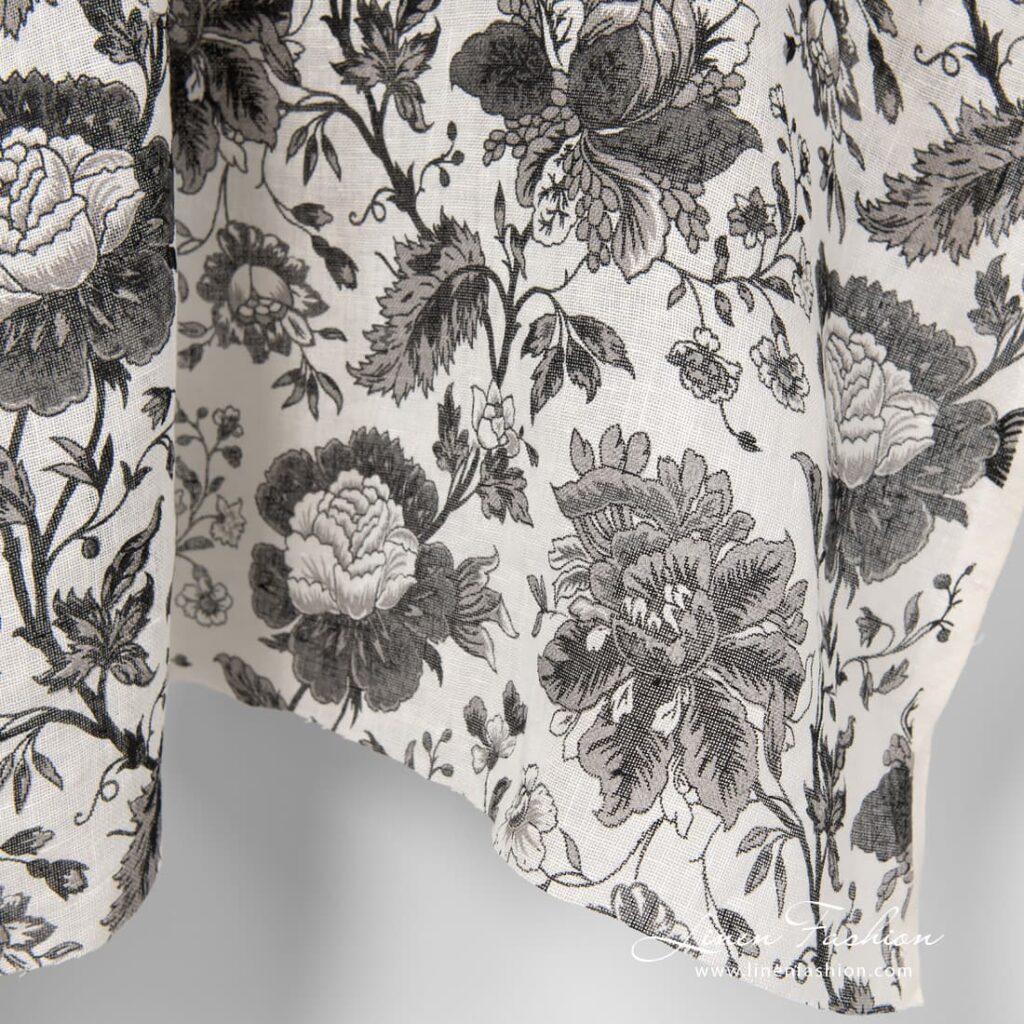 100% linen fabric with black flowers.
