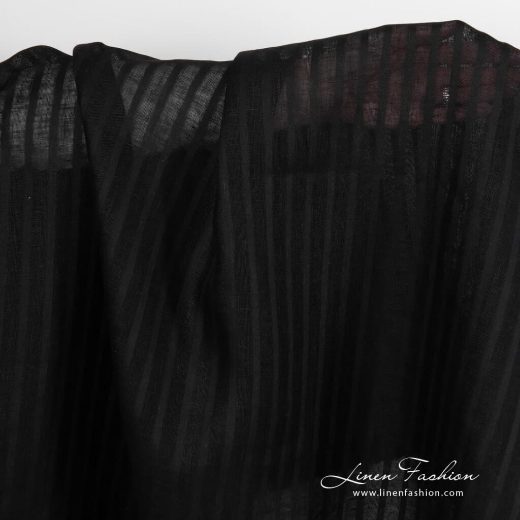 Lightweight black linen fabric.