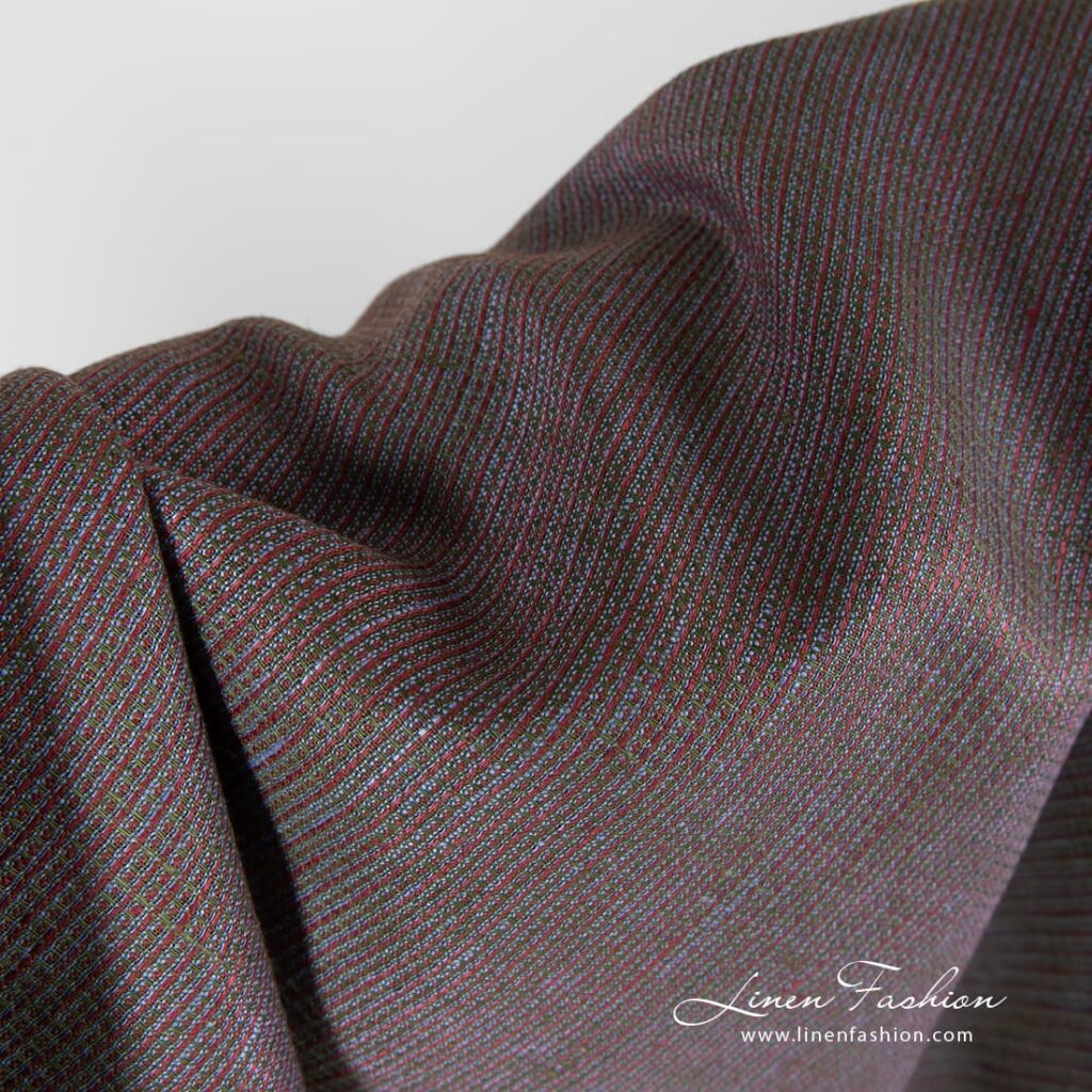 Waffle pattern multi coloured linen fabric.