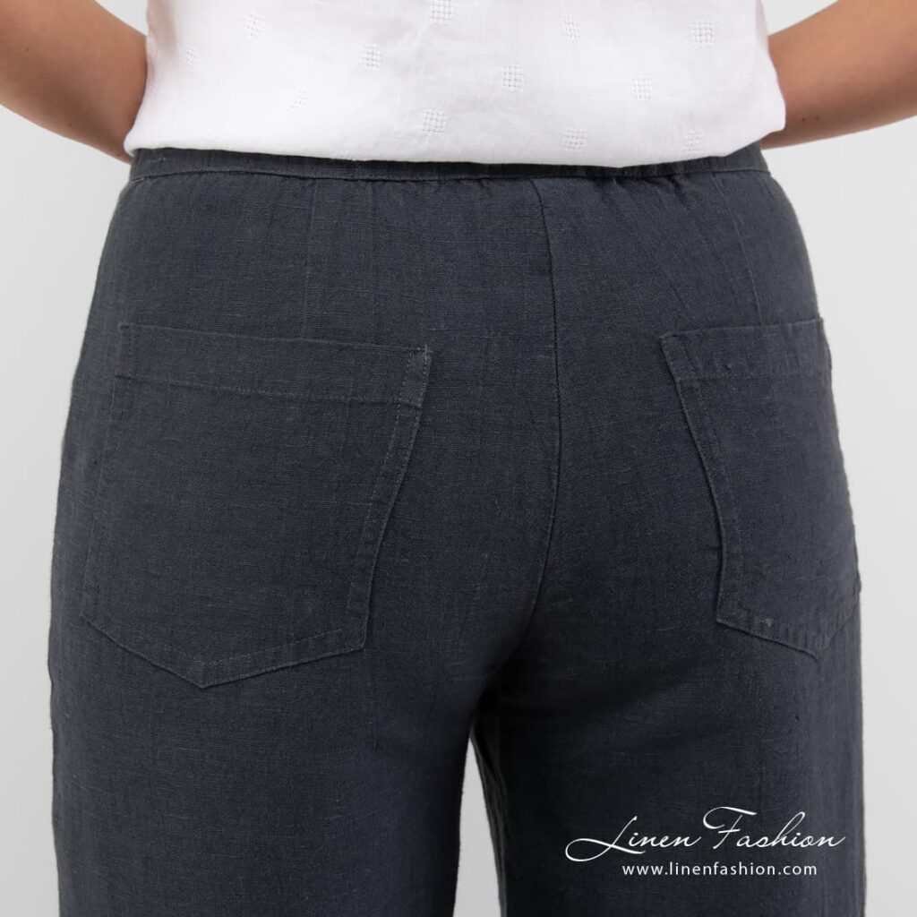 Dark grey dyed pants.