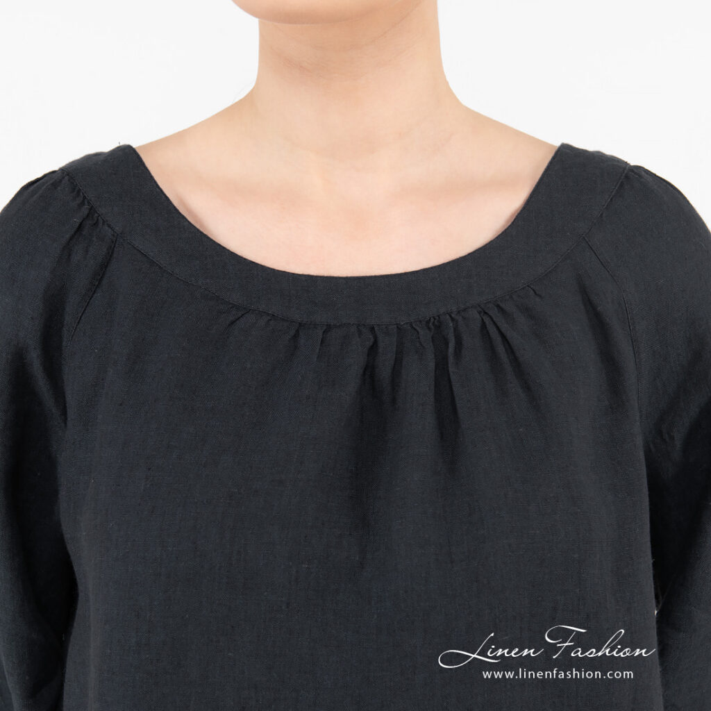 navy linen blouse with rounded neck.