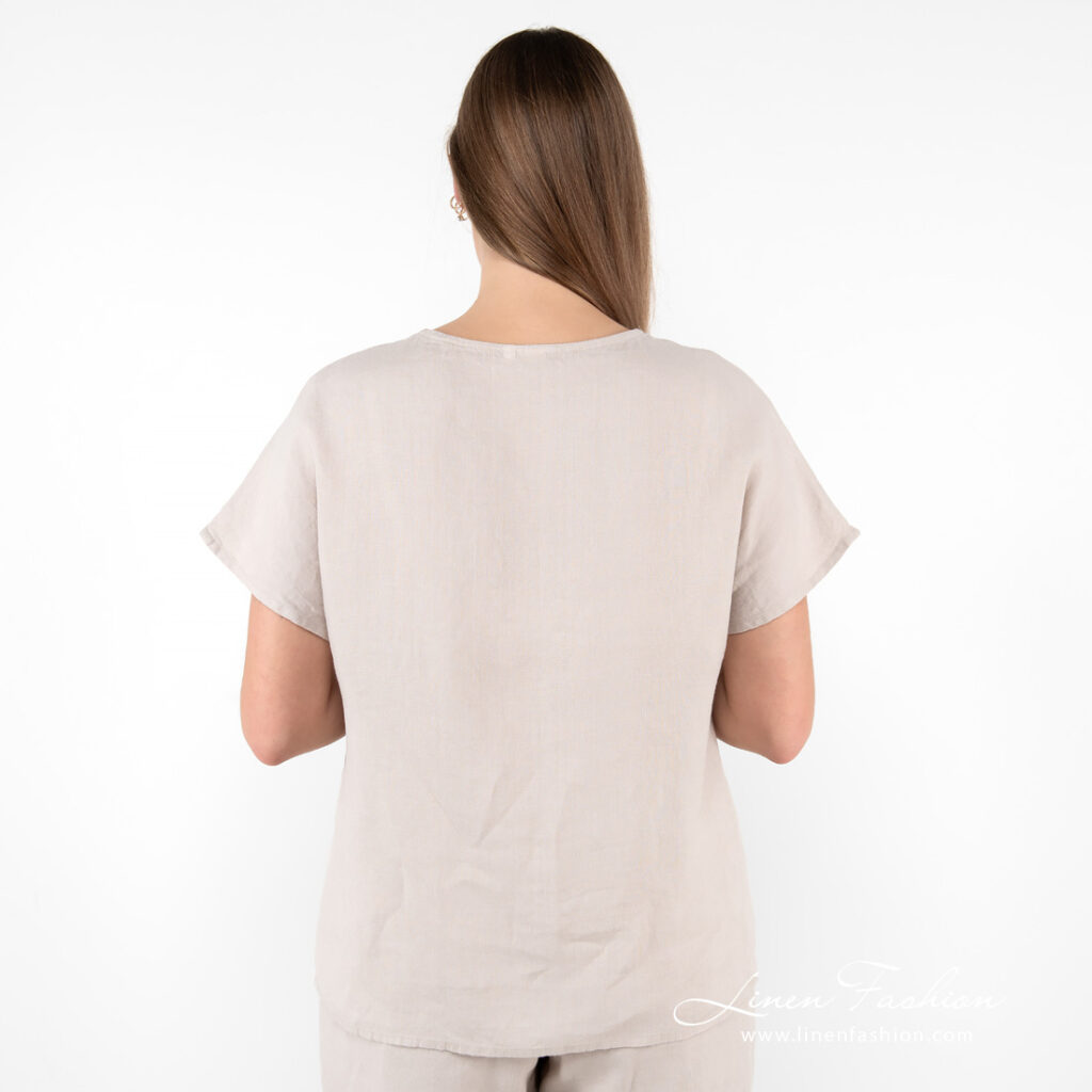 beige linen blouse from backside.