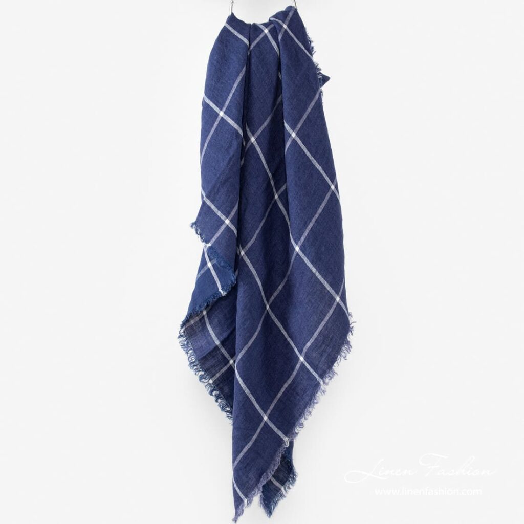 Blue colored linen scarf, checkered.