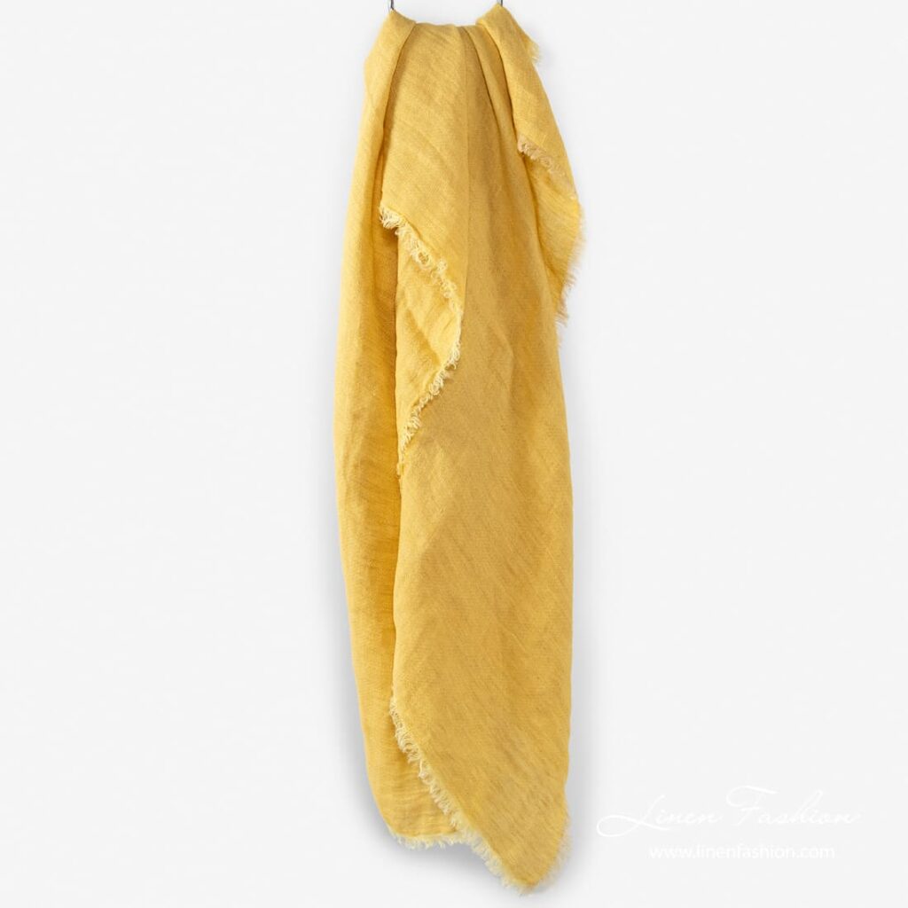 Linen scarf in yellow color.