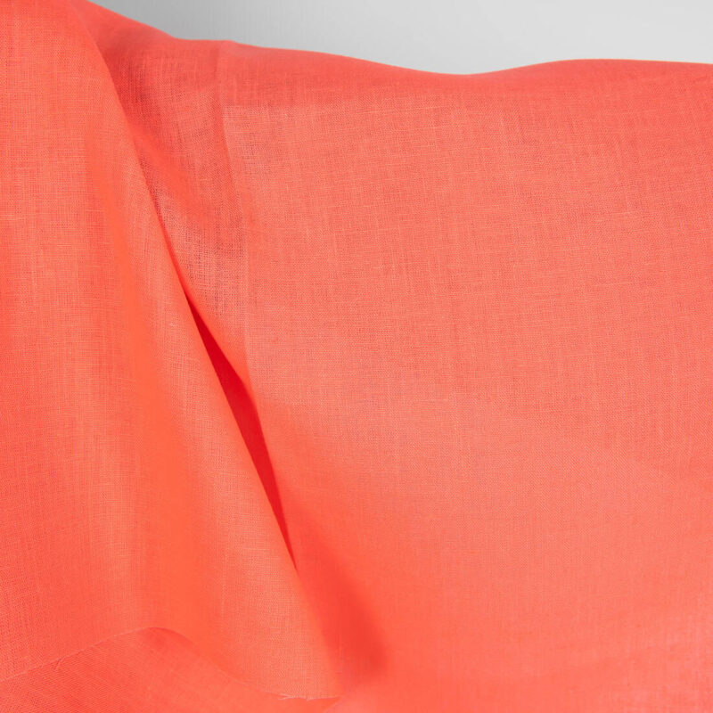 Linen fabric in living coral colour texture