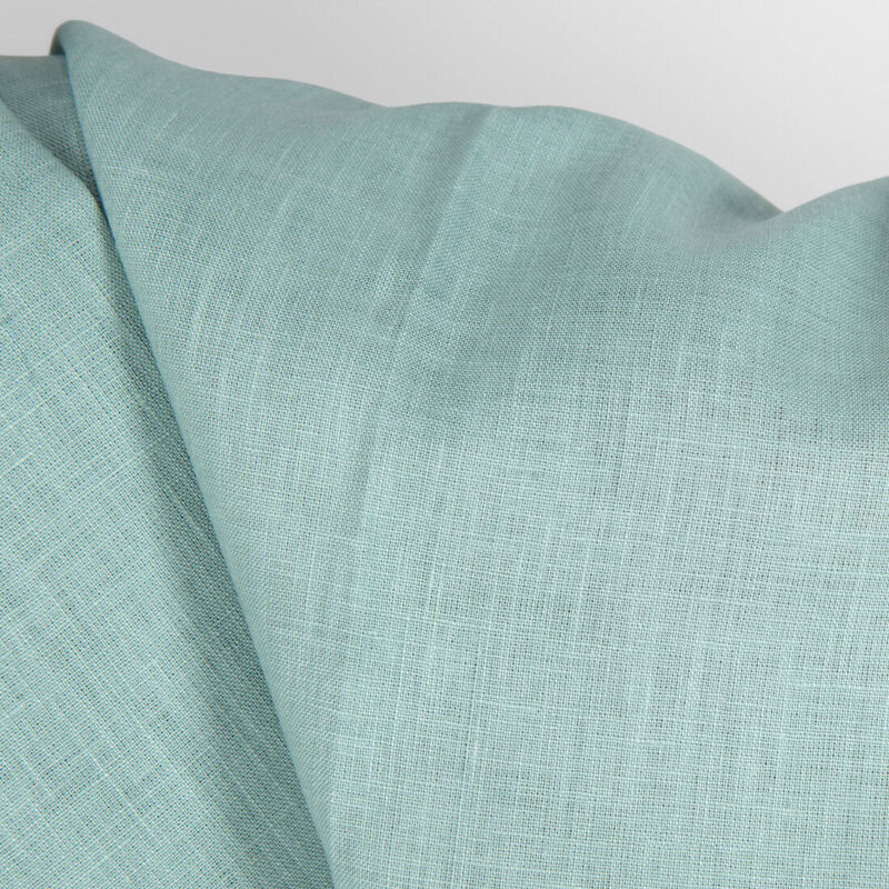 Linen fabric in jadeite colour close up detail