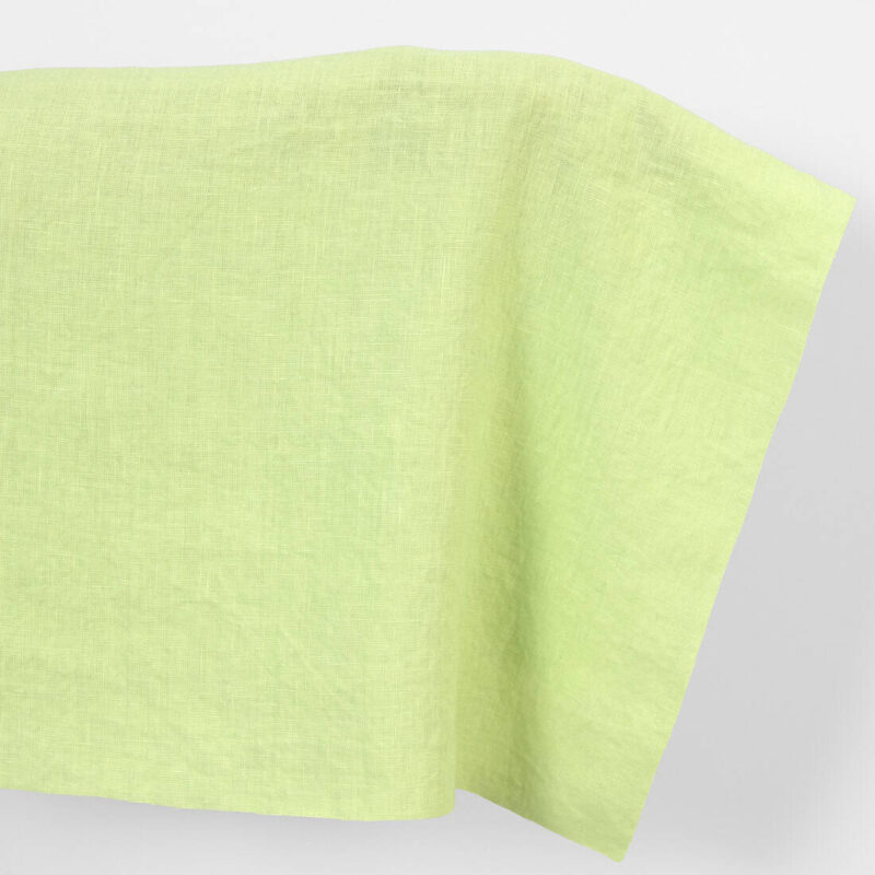 Linen fabric plain pale green, washed