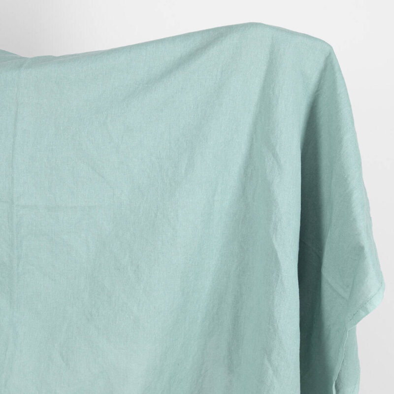 Linen cotton fabric in jadeite colour, washed